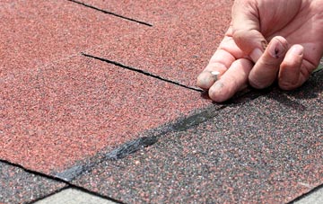 Wooth asphalt roof repairs